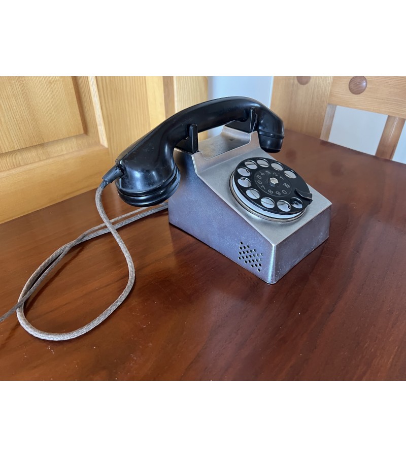 Telefonas metaliniu korpusu, Bauhaus stiliaus. Gamintojas H. Fuld & Co, Vokietija. 1926-1928 m. Kaina 178