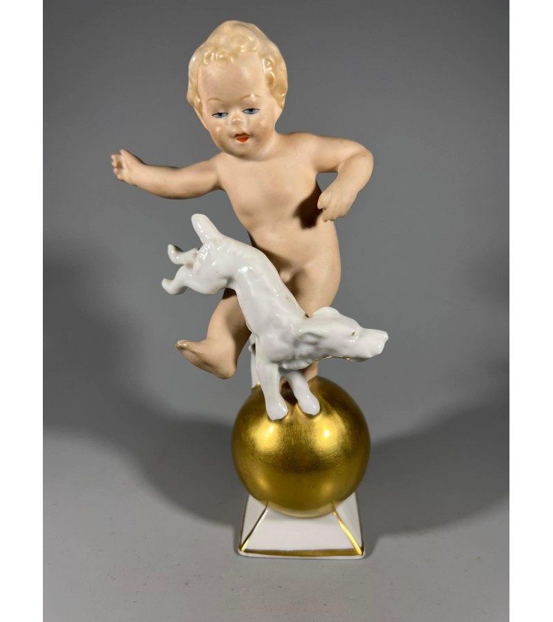Statulėlė porcelianinė, antikvarinė Berniukas Putti su šunimi. Porceliano manufaktūra Gerold & Co, Bavaria, Vokietija. XX a. vid. 1949 m. Kaina 73