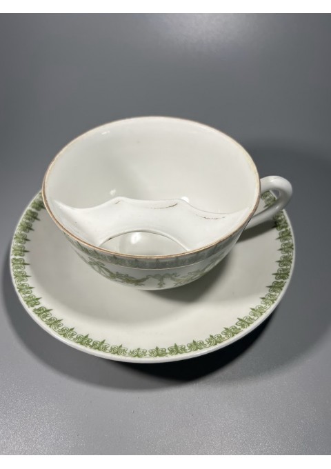 Puodelis su lėkštute vyrams su ūsais, antikvarinis, porcelianinis Haviland Limoges France. Talpa 310 ml. Kaina 88