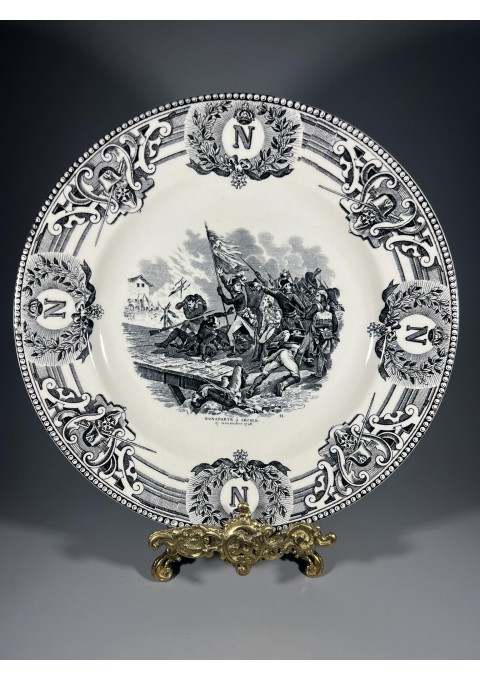 Lėkštė kolekcinė, porcelianinė karine Napoleon mūšių tema. Belgija. Skersmuo 24 cm. Kaina 33