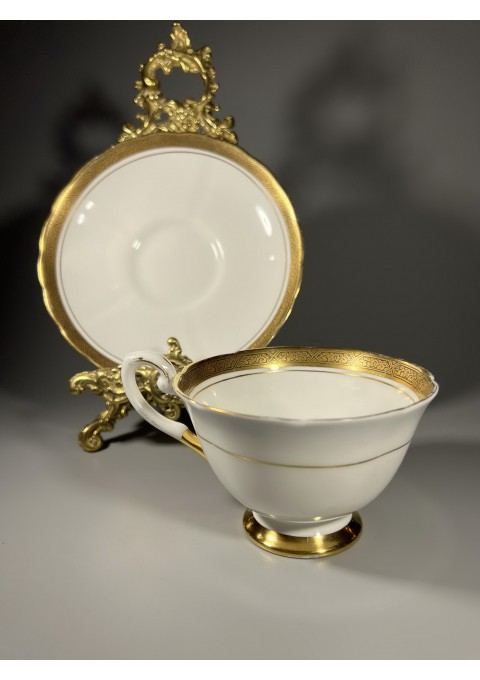 Puodekiai su lėkštute porcelianiniai, antikvariniai TUSCAN, FINE ENGLISH BONE CHINA, MADE IN ENGLAND. 1947 m. Talpa 180 ml. 4 vnt. Kaina po 13