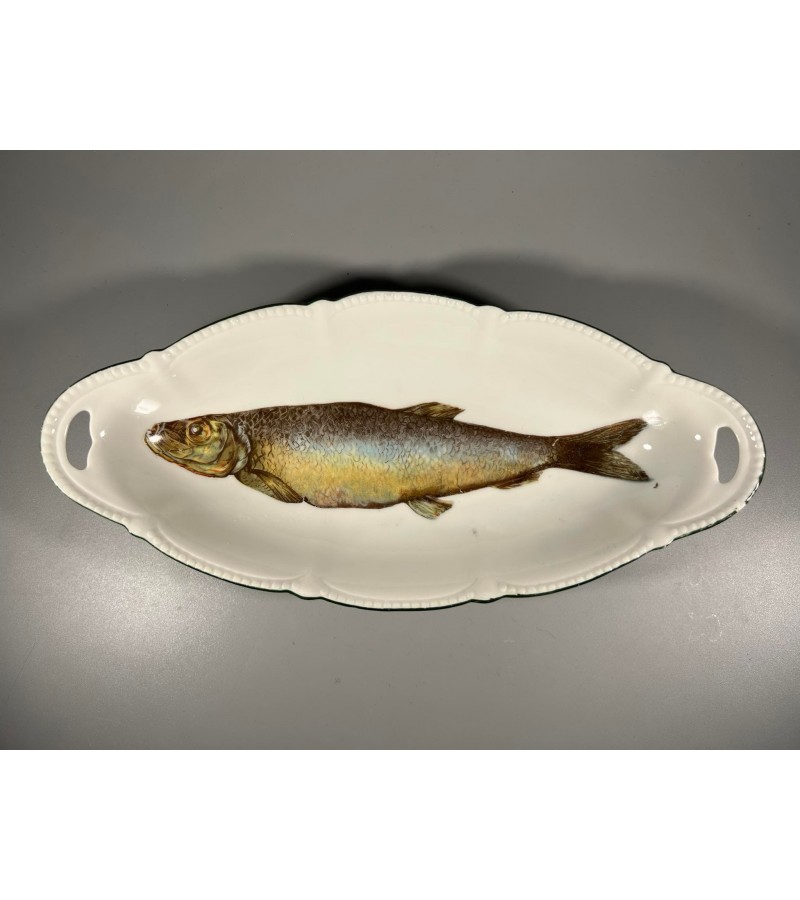 Lėkštė porcelianinė gili puošta žuvim, antikvarinė. Kaina 23