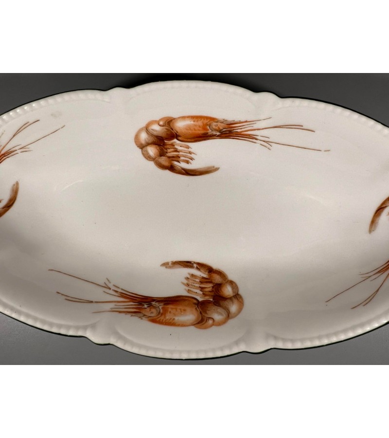 Lėkštė porcelianinė gili puošta krevetėmis, antikvarinė (Žuv). Kaina 28
