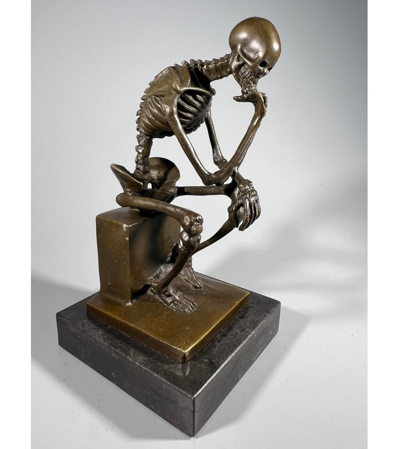 Statulėlė bronzinė Mąstytojo skeletas, pagal O. Rodeno skulptūrą Mąstytojas. Autorius Max Milo, gamintojas Prancūzija. Kaina 213