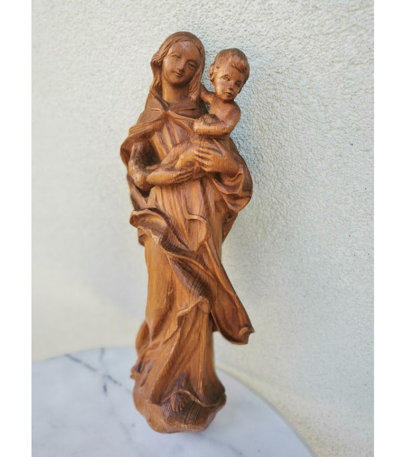 Statula medinė, pakabinama Šv. Marijos su kūdikėliu Jėzumi. Kaina 92
