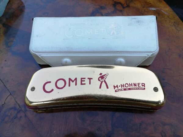 Armonikele Hohner Comet su deklu. Kaina 53