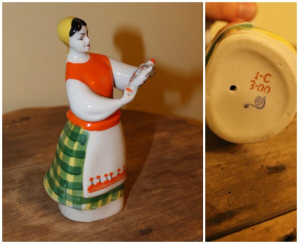 Statulėlė porcelianinė Mergina su arbatinuku. Kaina 33