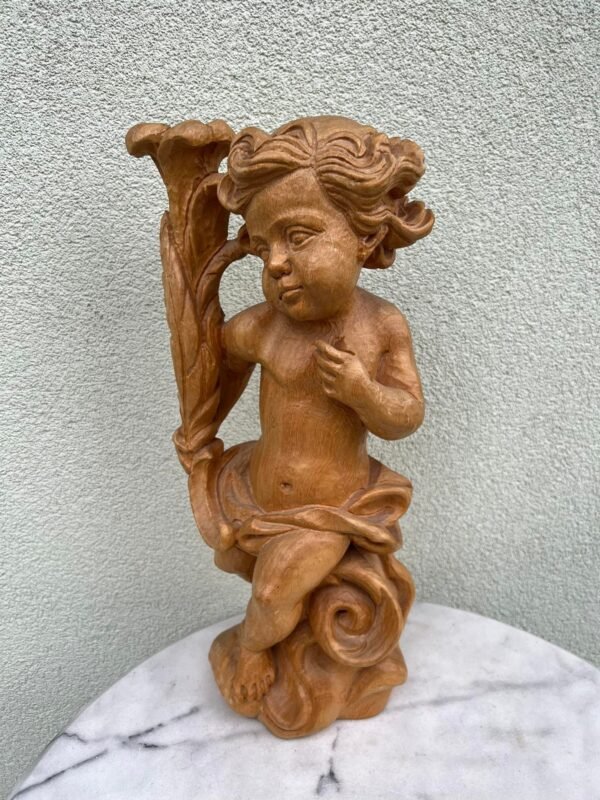 Statula Kupidonas, baroko stiliaus, išdrožta iš kaštainio medienos, antikvarinė. Aukštis 50 cm. Kaina 163