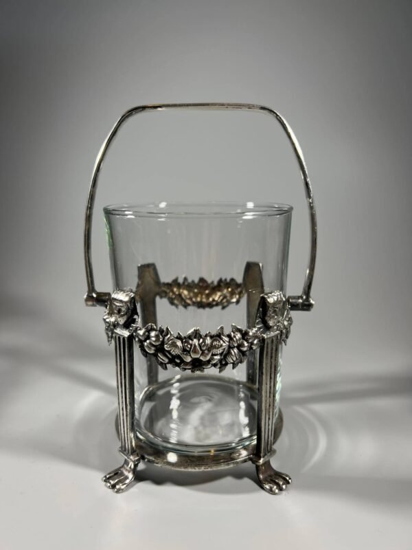 Indas antikvarinis, sidabruotas M & Co, Marples & Co of Sheffield. 1900 - 1907 m. Anglija. Puoštas Egipto faraono galvomis. Kaina 46