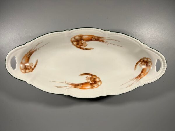Lėkštė porcelianinė gili puošta krevetėmis, antikvarinė (Žuv). Kaina 28