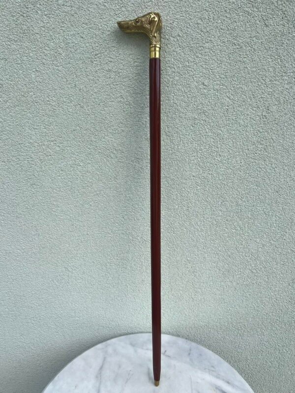 Lazdelė, lazda Šuo medinė, bronzine rankena. Tvirta. Kaina 78