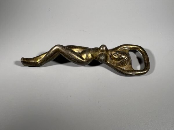 Atidarytuvas metalinis-Nuoga moteris. Tvirtas. Kaina 17