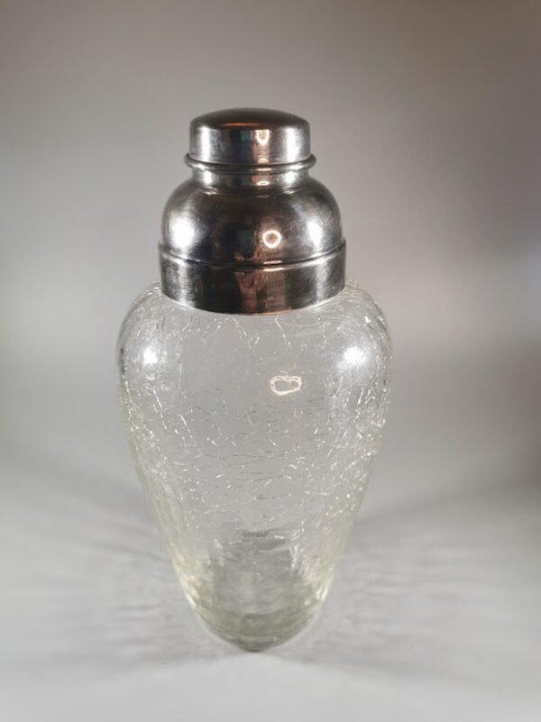 Kokteilių plaktuvas, šeikeris ledo stiklo, sidabruotu kamščiu, antikvarinis. Kaina 43