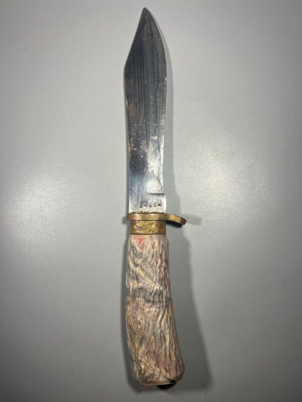 Peilis medžioklinis, antikvarinis, dekoratyvi kaulo rankenos imitacija, tvirtas plienas, numeruotas. Kaina 36