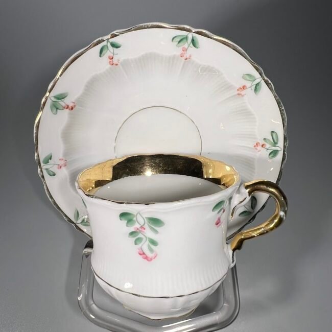 Puodelis-su-lekstute-porcelianiniai-C.T.-prusija201.jpg