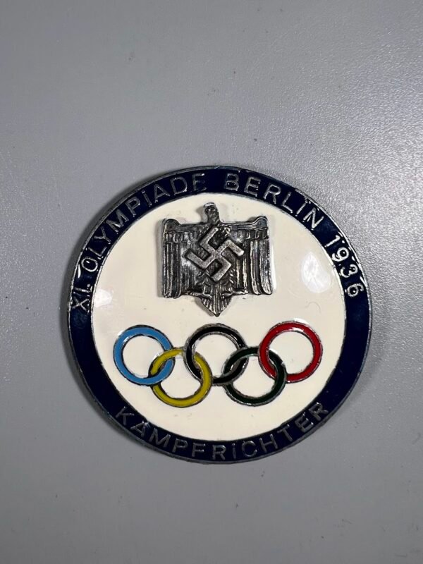 Ženklelis, 1936 m. Berlyno vasaros olimpinių žaidynių teisėjo (vok. Kampfrichter) ženklelis. Replika. Kaina 13