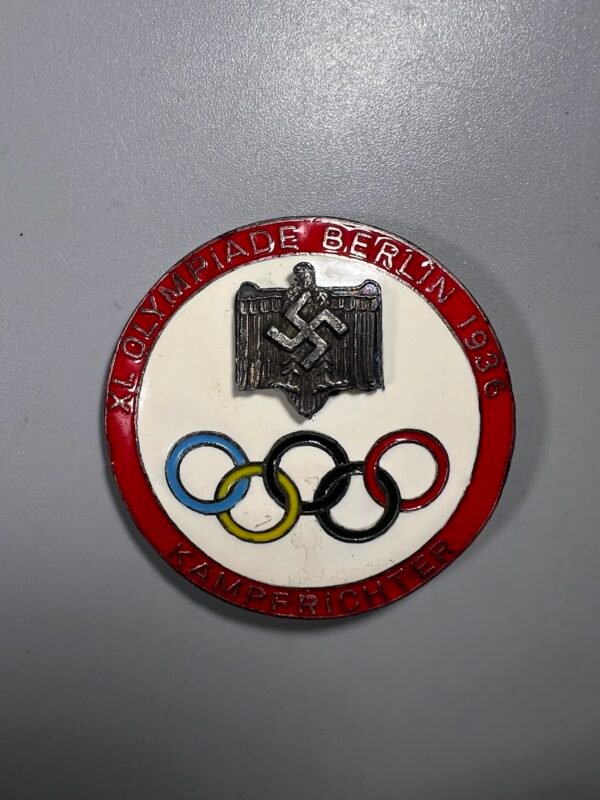 Ženklelis, 1936 m. Berlyno vasaros olimpinių žaidynių teisėjo (vok. Kampfrichter) ženklelis. Replika. Kaina 13