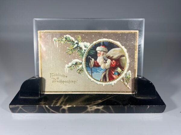 Rėmelis antikvarinis, marmurinis, Art Deco stiliaus, su 1911 m. Kalėdiniu atviruku. Kaina 43 už viską.