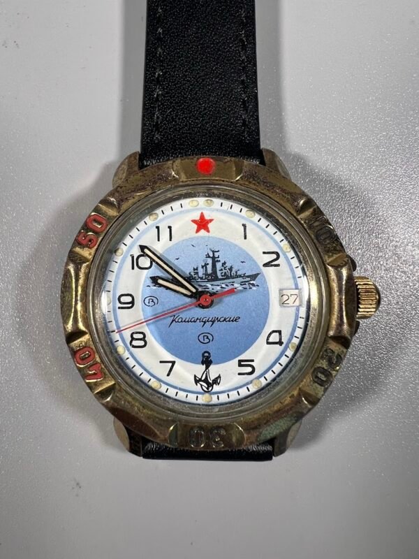 Laikrodis Vostok Komandirskie, serija 211, modelis 211879, mechaninis, vyriškas, sovietinis, rankinis, skirtas karinio jūrų laivyno tematikai. Veikiantis. Kaina 68