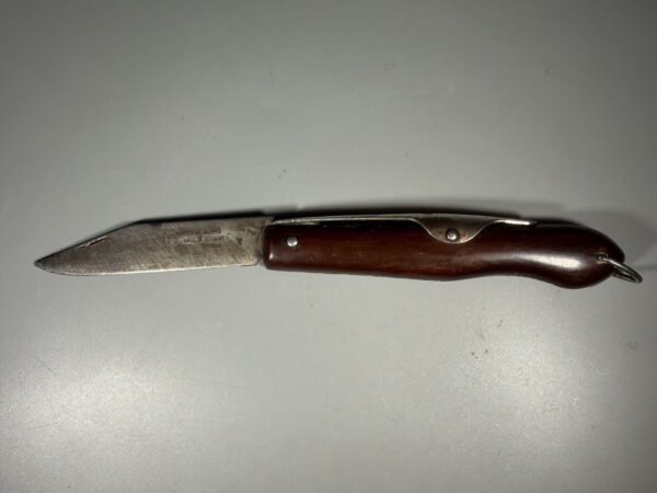 Antikvarinis vokiškas lenktinis peilis „Okapi Made in Germany“ su išorine spyruokle (17 cm)