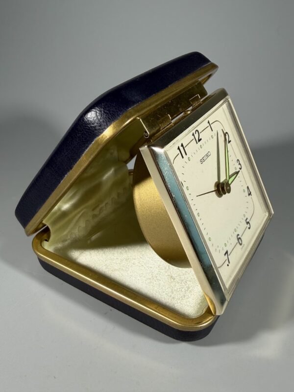 Vintažinis mechaninis kelioninis žadintuvas „Seiko“ (Japonija, XX a. 7–8 deš.)